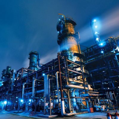 Oil Refinery, Chemical & Petrochemical plant abstract at night.